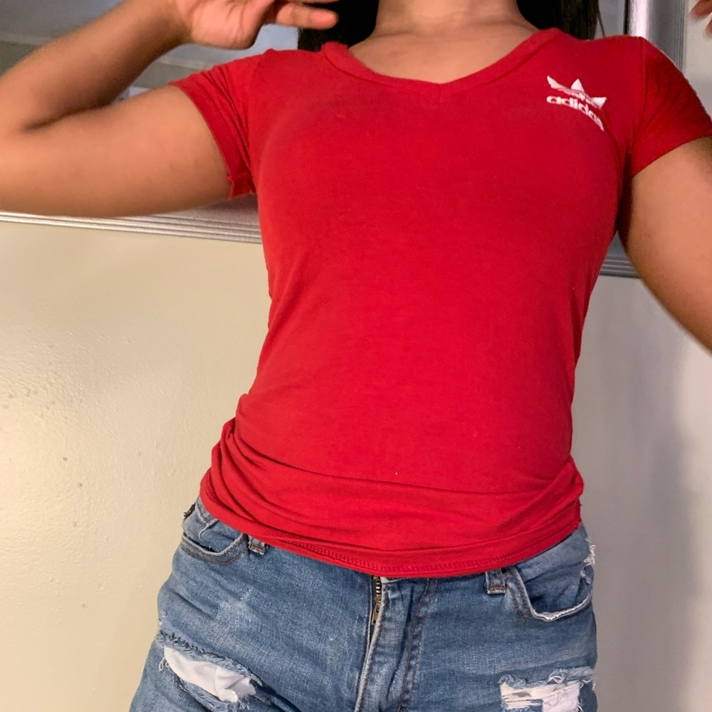 Woman’s 3 -stripped shirt